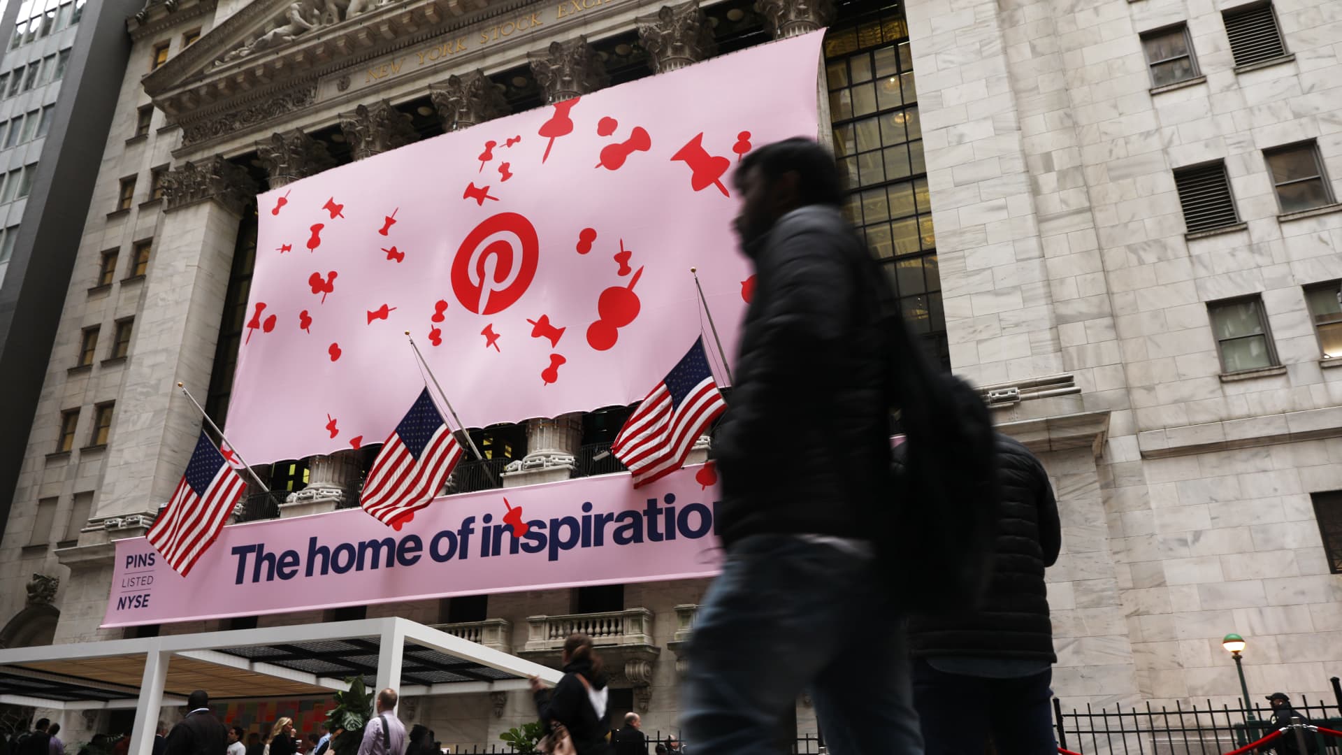 A banner for the online image board Pinterest Inc. hangs from the New York Stock Exchange on the morning that Pinterest makes its initial public offering on April 18, 2019.