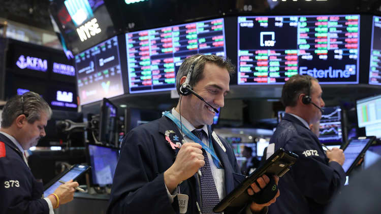 The Dow and S&P 500 close at record high