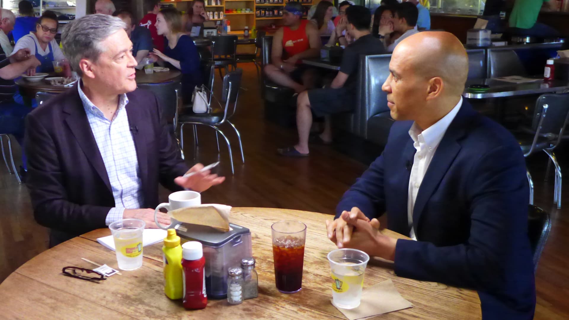 Democratic presidential candidate Cory Booker walks the line between business and the left