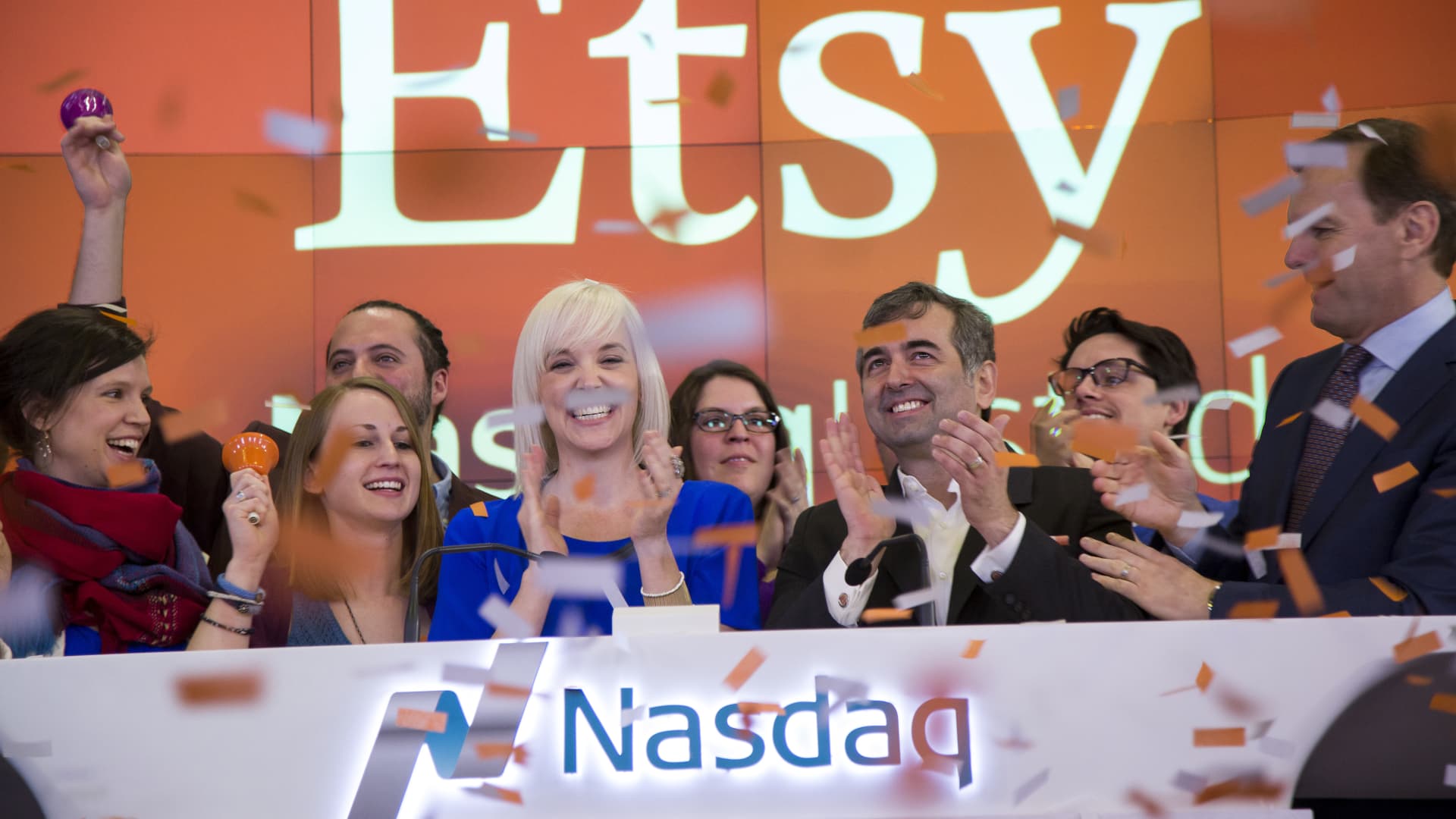 Executives of Etsy applaud as they open the Nasdaq MarketSite ahead of Etsy's initial public offering in New York, April 16, 2015.