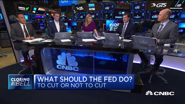 Two experts debate whether the Fed should cut rates next week