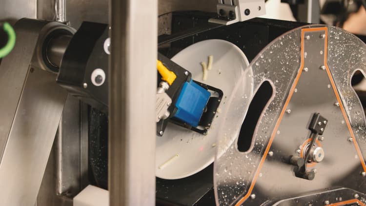 Dishcraft's robotic dishwasher automates the dull and dirty job of washing plates