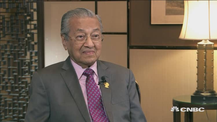 Taking sides in the trade war will be a 'disaster for the world:' Malaysia PM