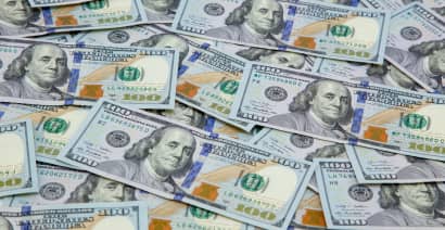 Dollar climbs as coronavirus variant negates stimulus optimism 