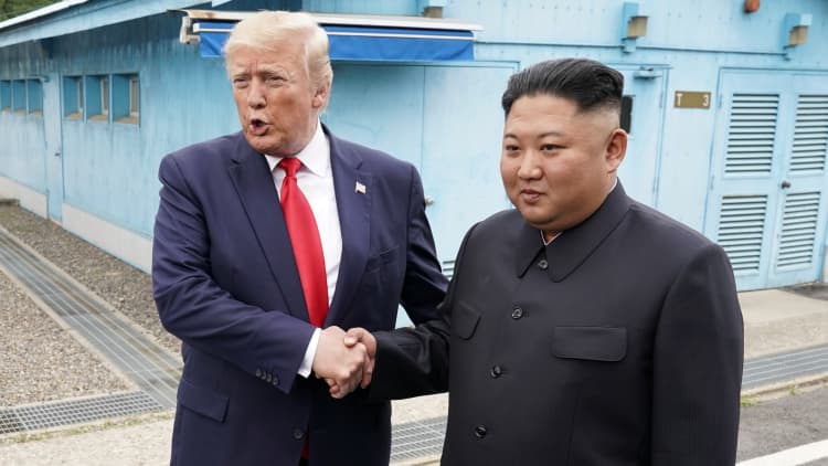 Trump becomes first sitting US president to cross border into North Korea
