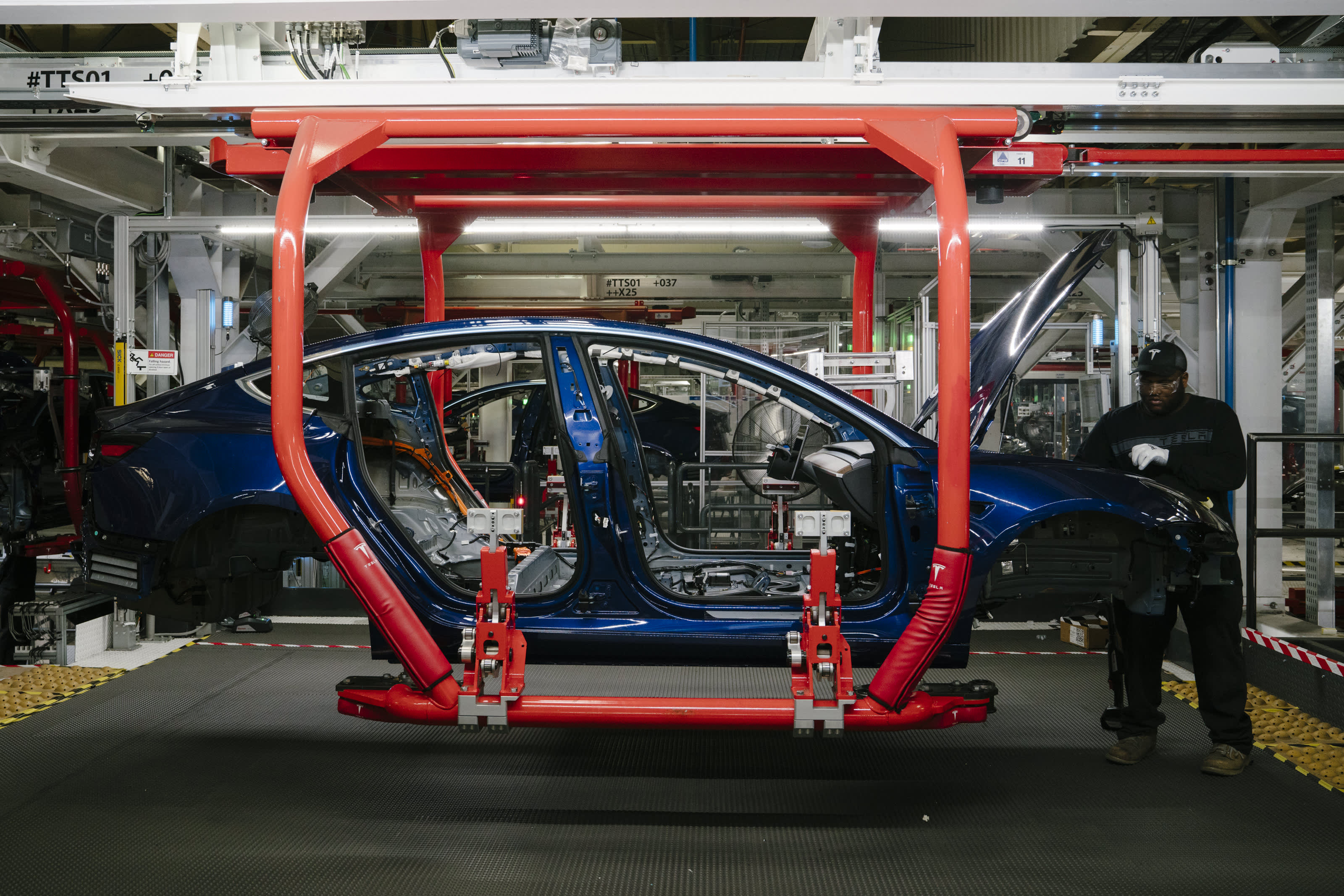 Tesla memo: Essential employees, including production, should still ...