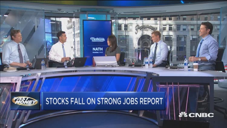 Stocks fall as strong jobs report dampens hopes of rate cut