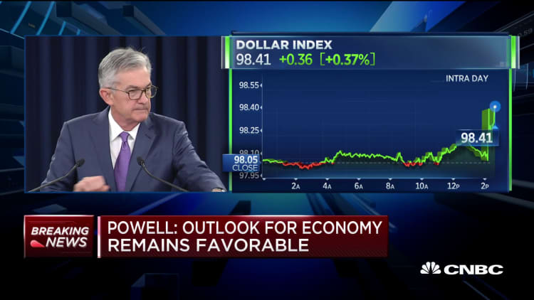 Fed's Powell: Rate cut is a midcycle adjustment to policy