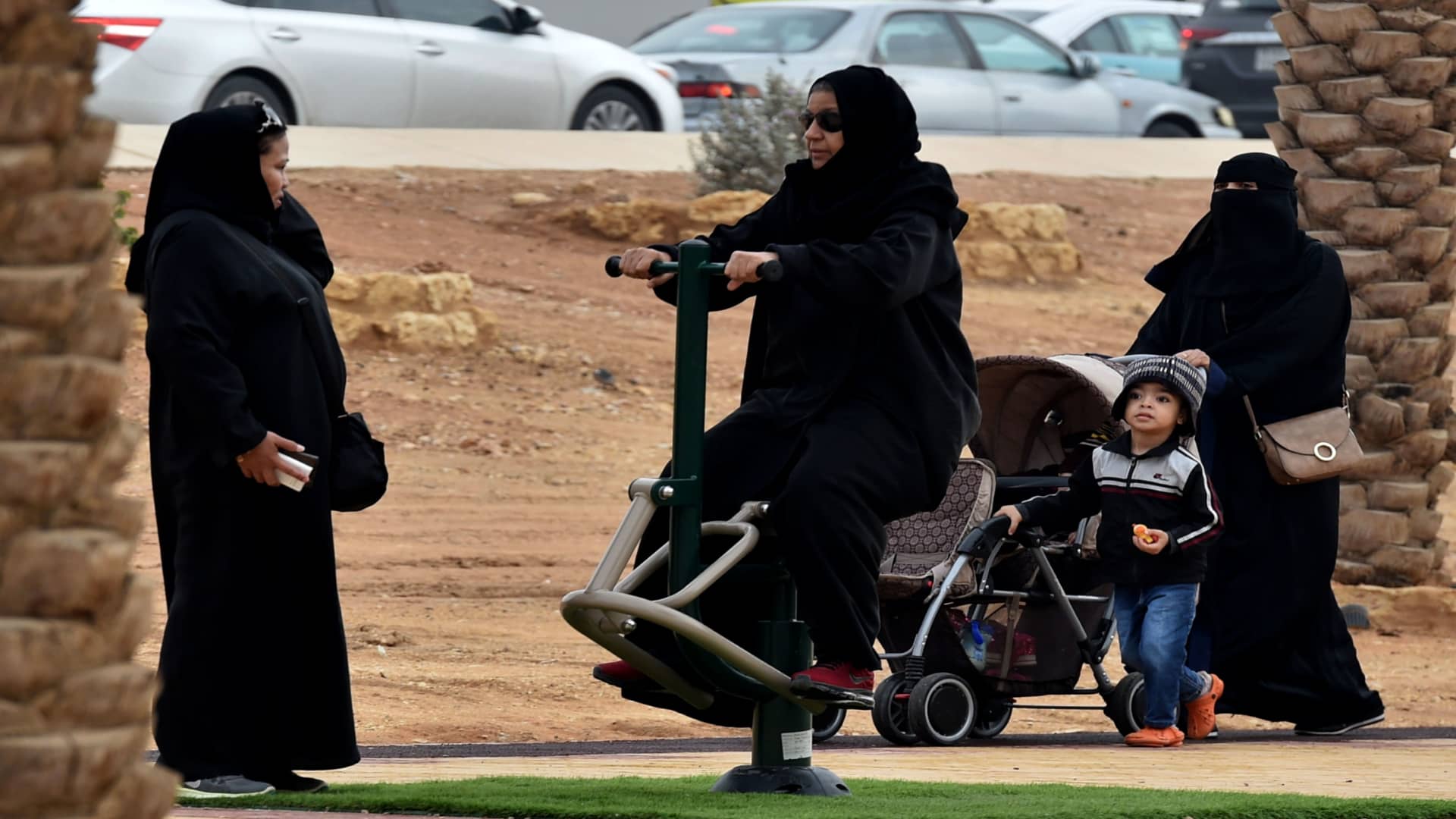 A Saudi woman plays in a playground pior to the 2018 Saudia Ad Diriyah E-Prix Formula E Championship in Riyadh, on December 15, 2018 in Riyadh. (Photo by FAYEZ NURELDINE / AFP)(Photo credit should read FAYEZ NURELDINE/AFP/Getty Images)