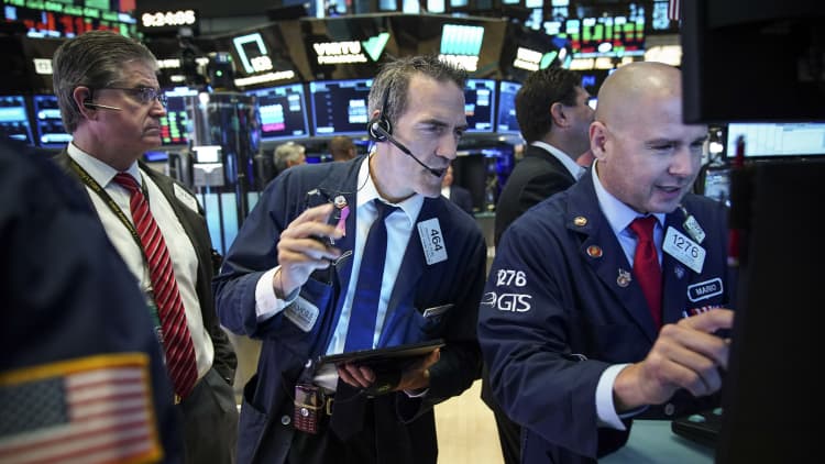 Dow reaches a record high — Watch three experts debate what investors should expect
