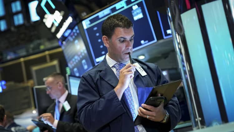 Futures point to higher open following wild swings