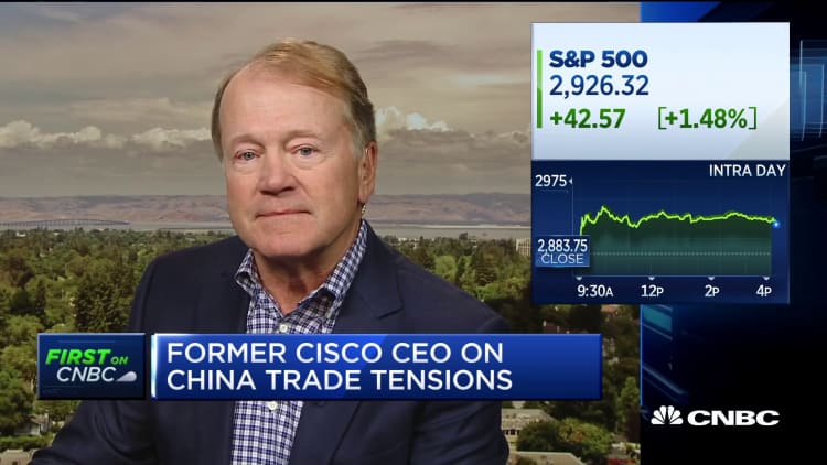 Here's what former Cisco CEO has to say on Hong Kong protests, Huawei and tariffs