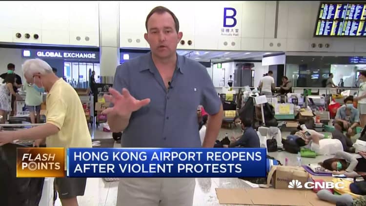 Hong Kong airport reopens after violent protests