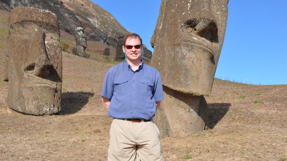 Brian Jacobs, founder of Moai Capital, in front of the moai statues on Easter Island.