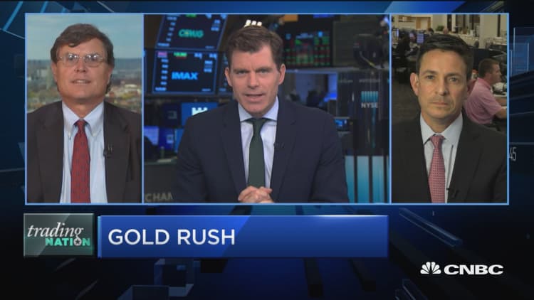Wait for gold pullback before investing at these levels: Strategist