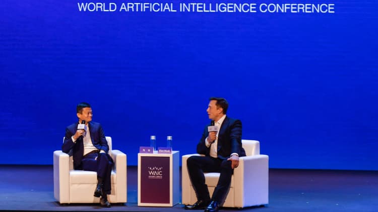 Watch Elon Musk and Jack Ma debate whether humans or computers are smarter