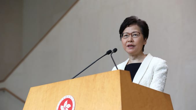 Image result for Hong Kong leader says she never discussed resigning with Beijing