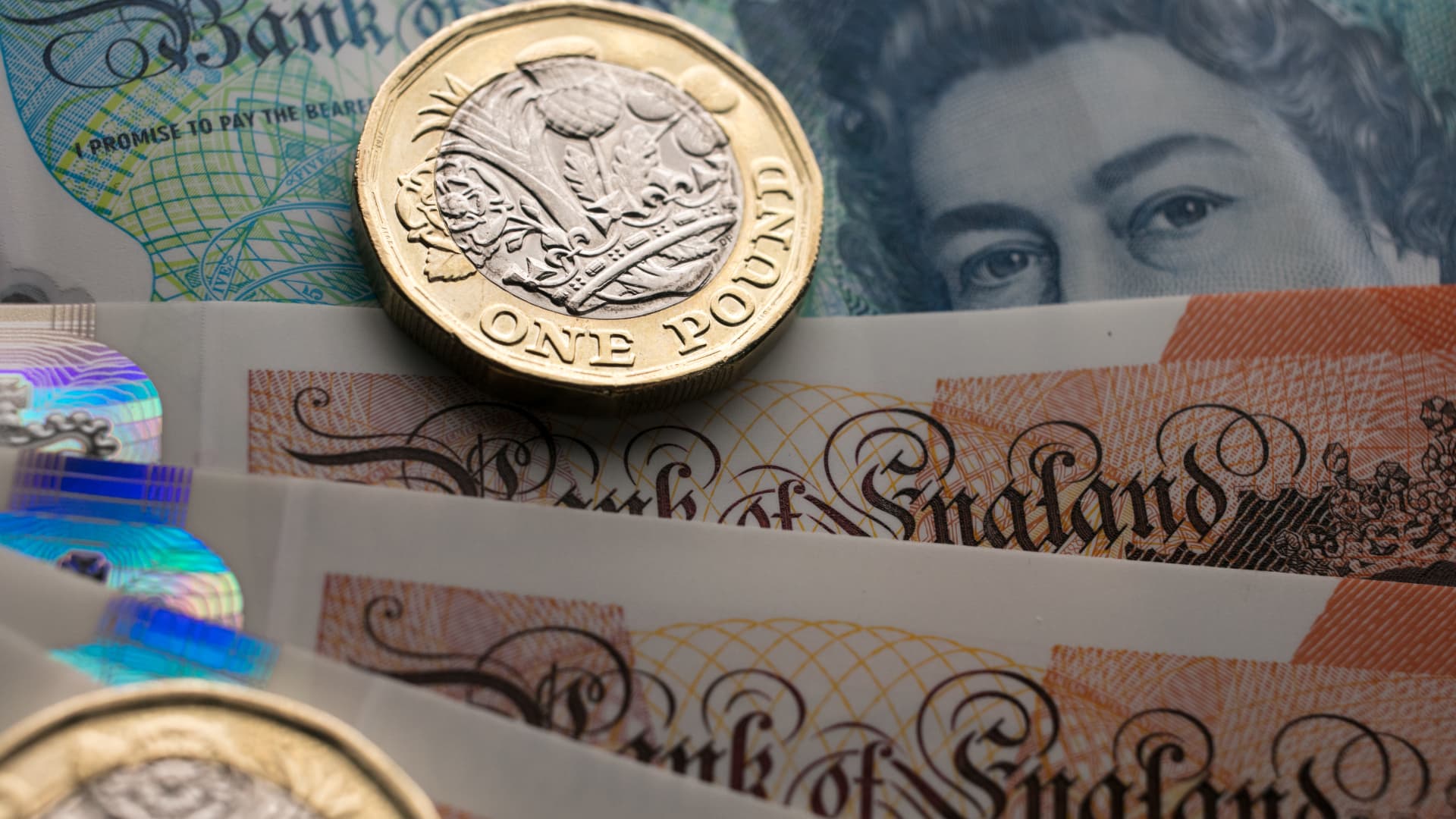 The British pound falls 2% against the dollar after a decline warning from the Bank of England