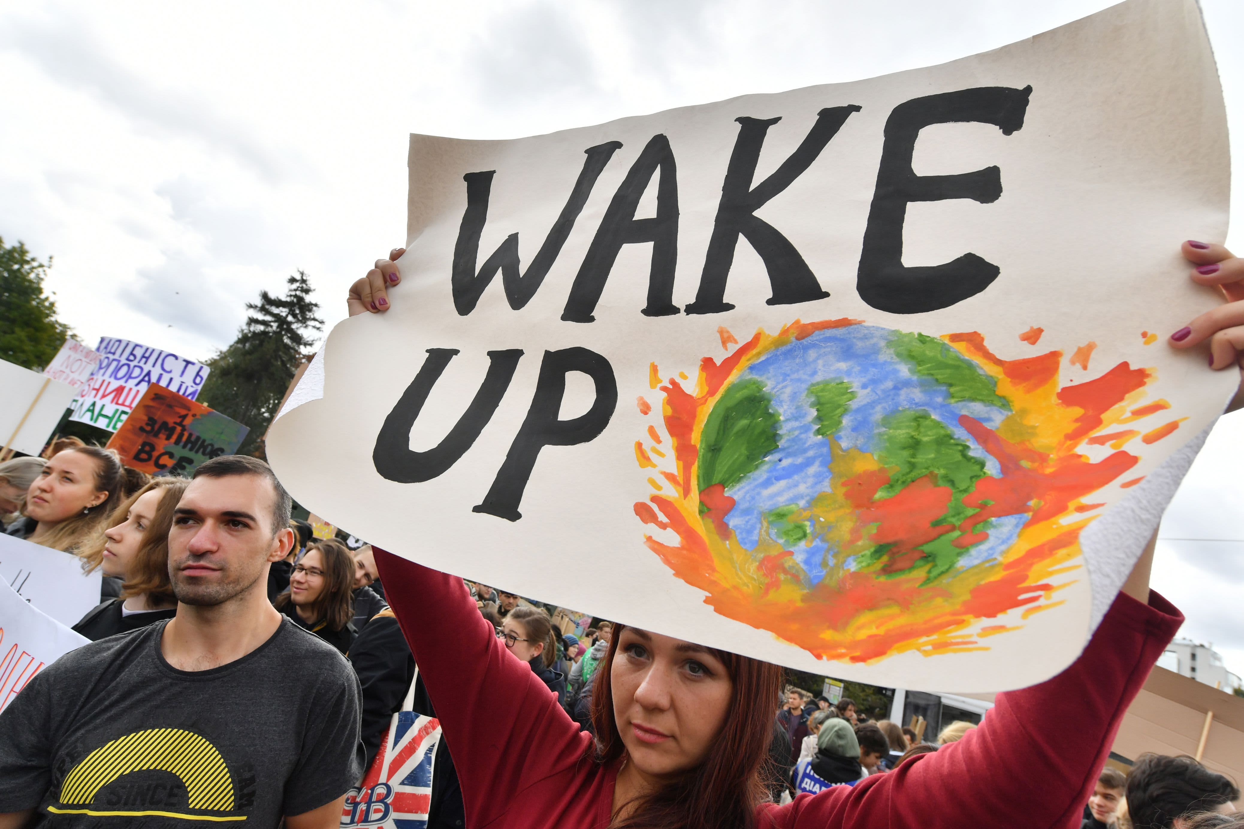 In pictures: Millions of protesters worldwide come together to demand  action on climate change