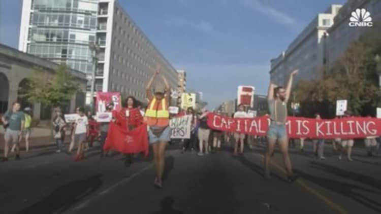 Climate change protesters block traffic in DC