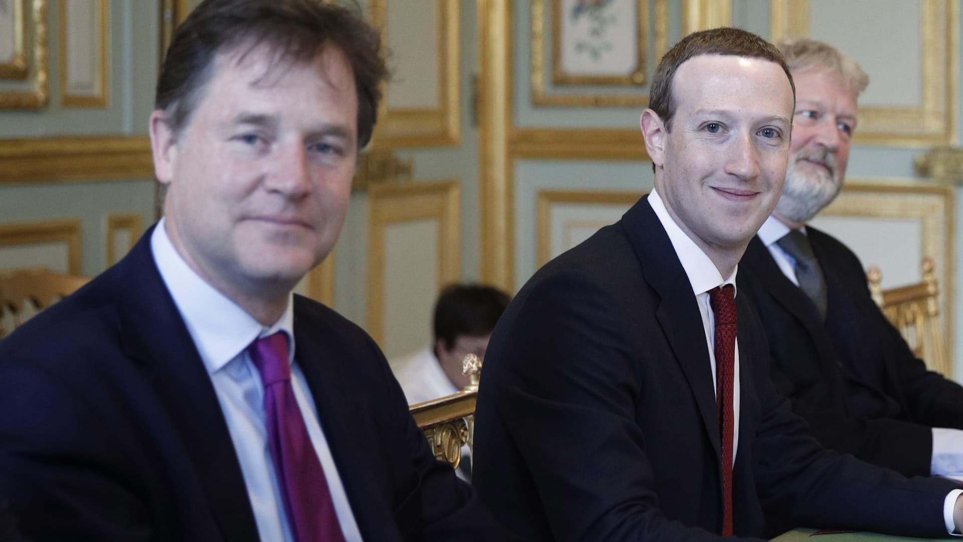 CEO and co-founder of Facebook Mark Zuckerberg poses next to Facebook head of global policy communications and former UK deputy prime minister Nick Clegg (L) prior to a meeting with French President at the Elysee Palace in Paris, on May 10, 2019.
