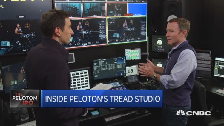 Peloton's CEO, on IPO day, takes CNBC into their live streaming classes control room