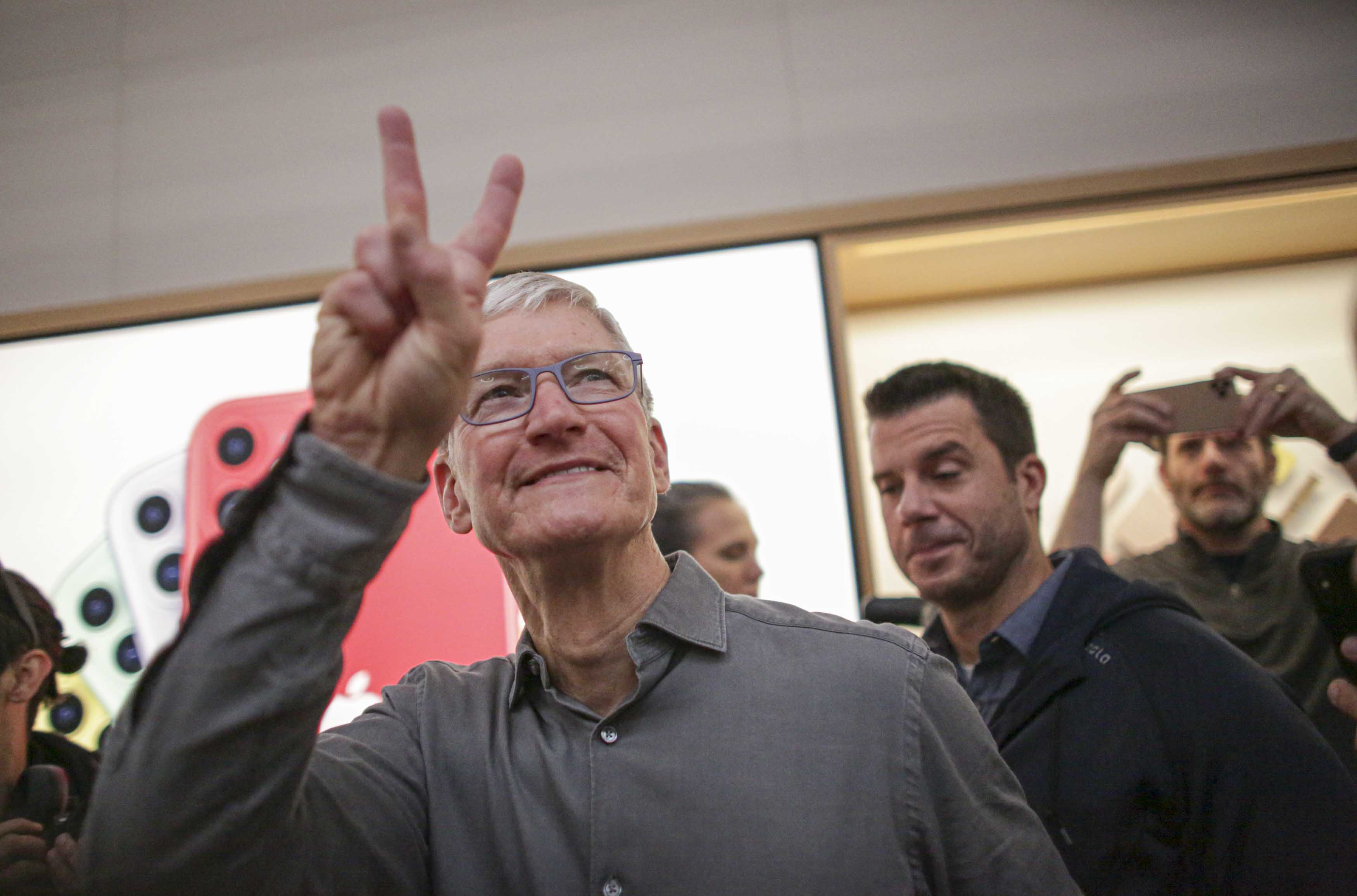 Apple CEO Tim Cook says he's taking on climate change and needs backup - CNBC