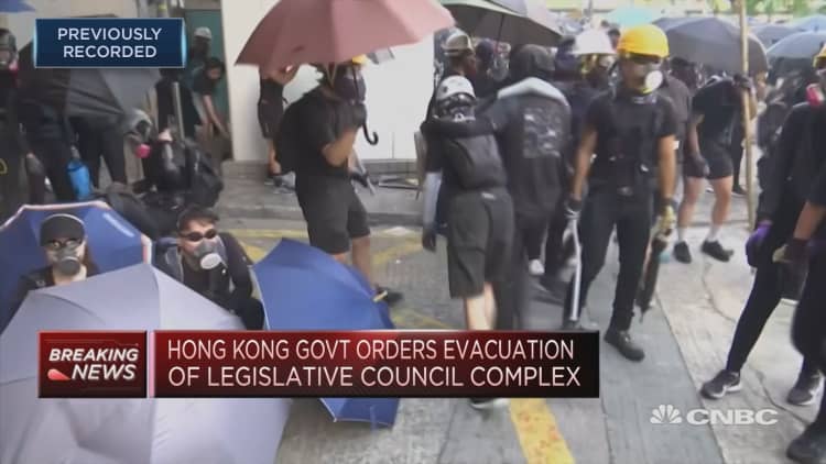 Hong Kong police fire tear gas at protesters on China's National Day