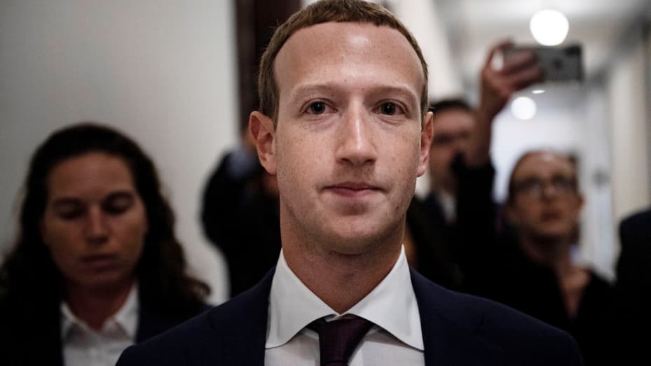 Facebook CEO Mark Zuckerberg walks to meetings for technology regulations