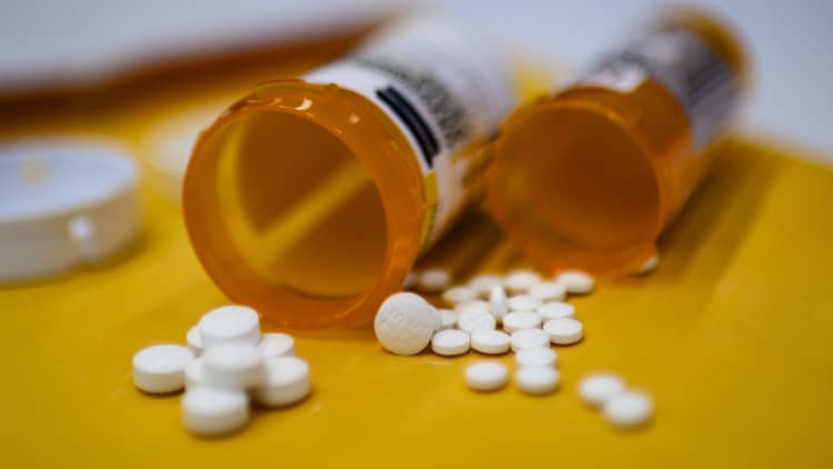 Four drug companies reach last-minute opioid settlement
