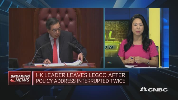 Pro-democracy lawmakers disrupt Hong Kong leader's address