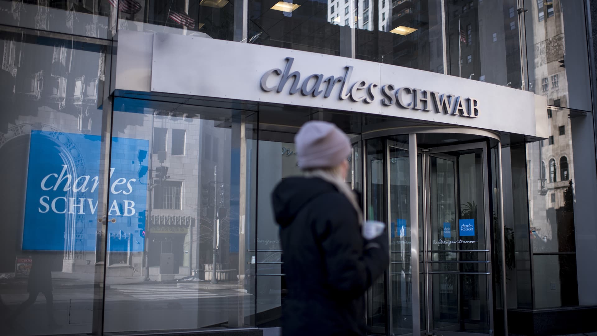 Bank of America double downgrades Charles Schwab, says clients will continue to shift to money market funds