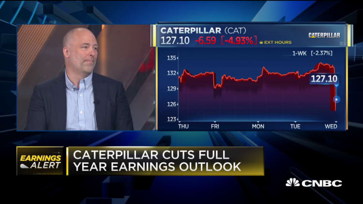 An analyst explains Caterpillar's earnings miss, full-year guidance cut