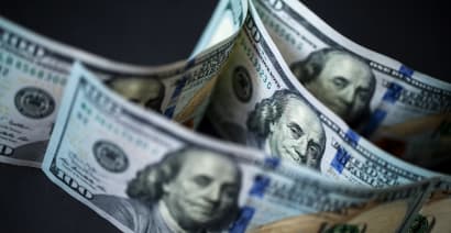 Dollar slips on report that U.S. stimulus talks to resume 