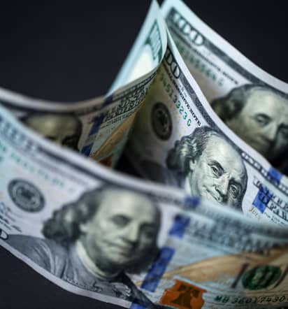 Dollar regains footing after Fed-driven stumble