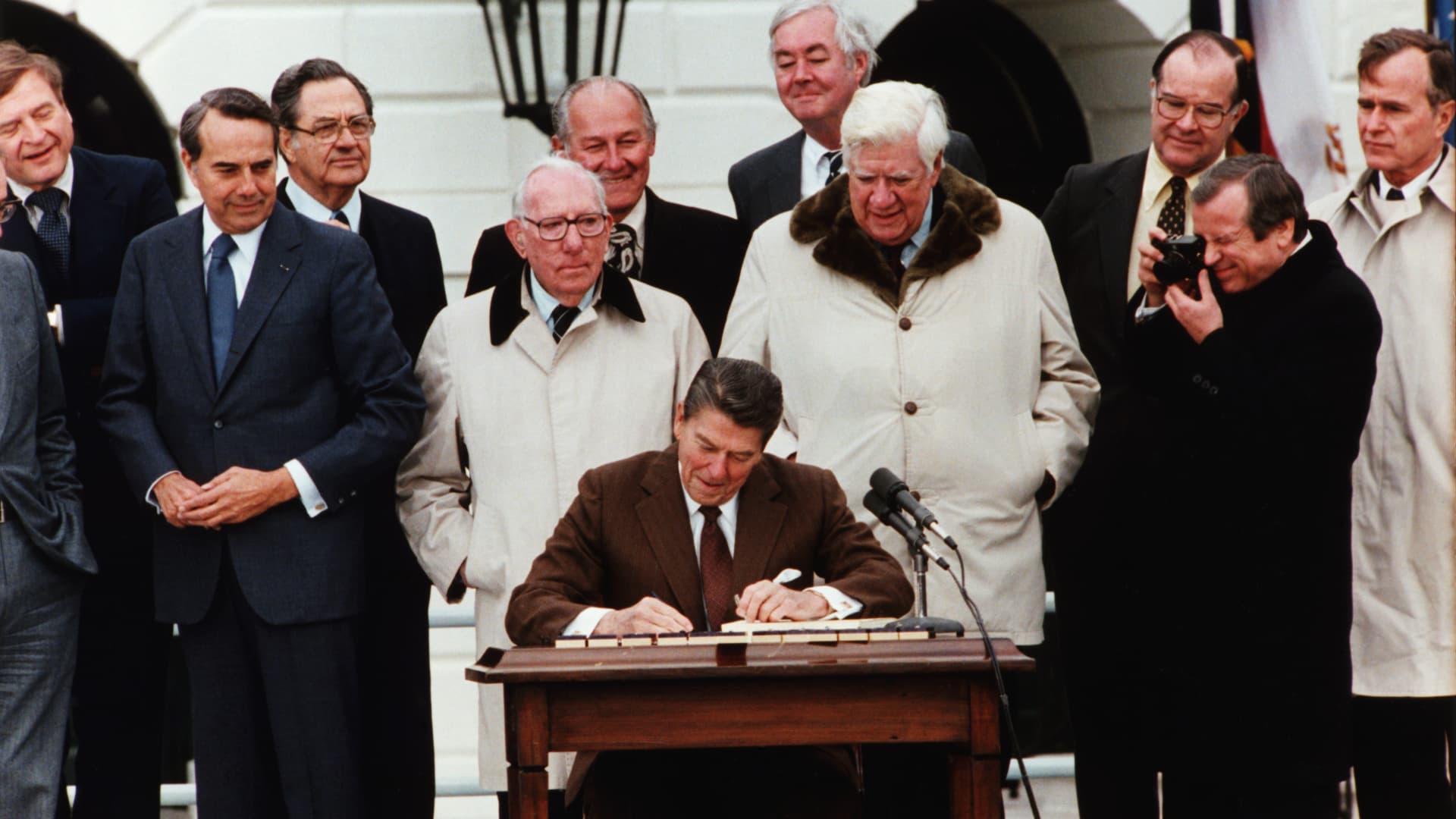 President Ronald Reagan signs the Social Security Act Amendment into law on April 20, 1983.
