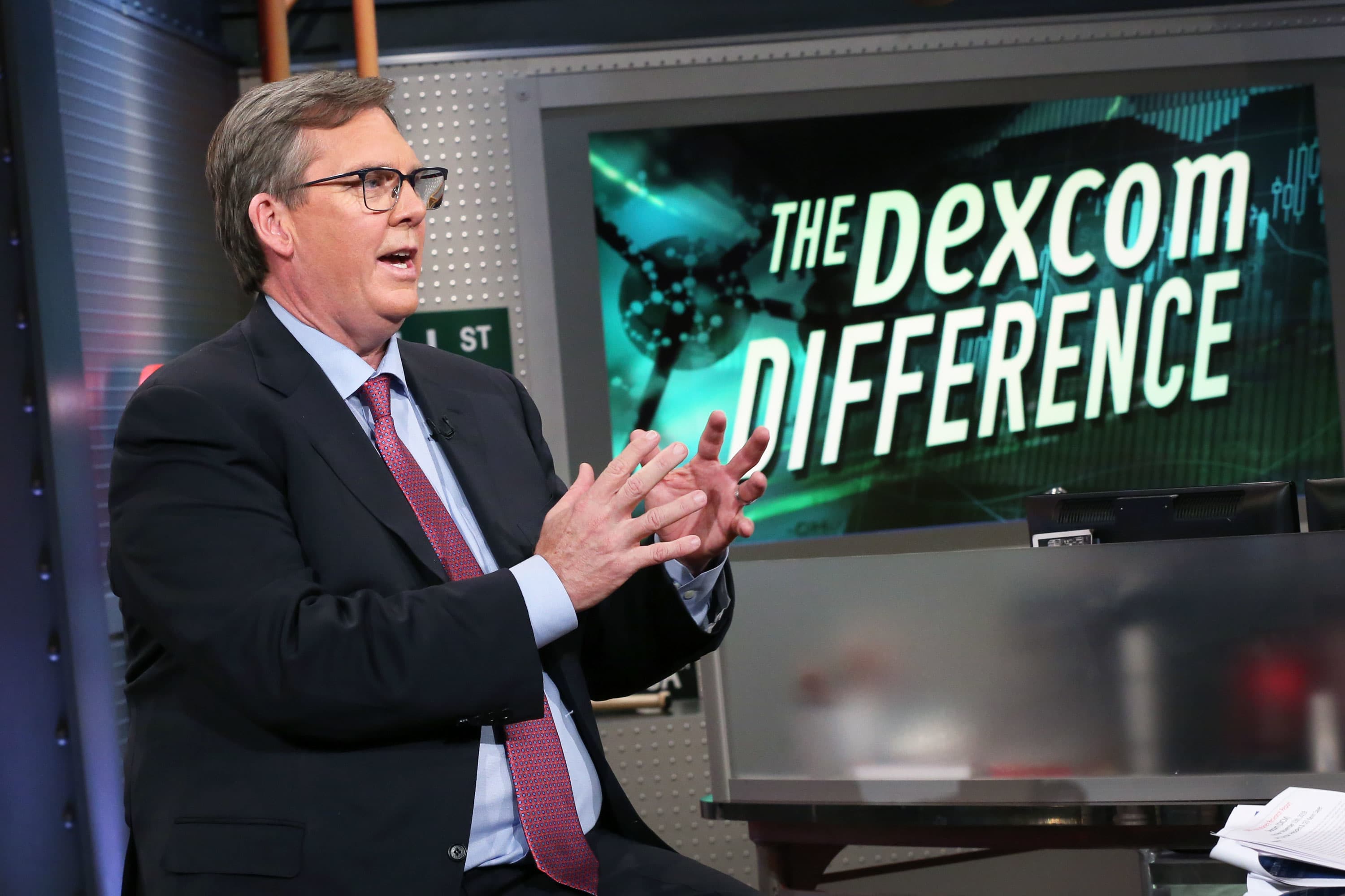 Dexcom CEO Kevin Sayer shows Nick Mills’ Super Bowl ad with the company