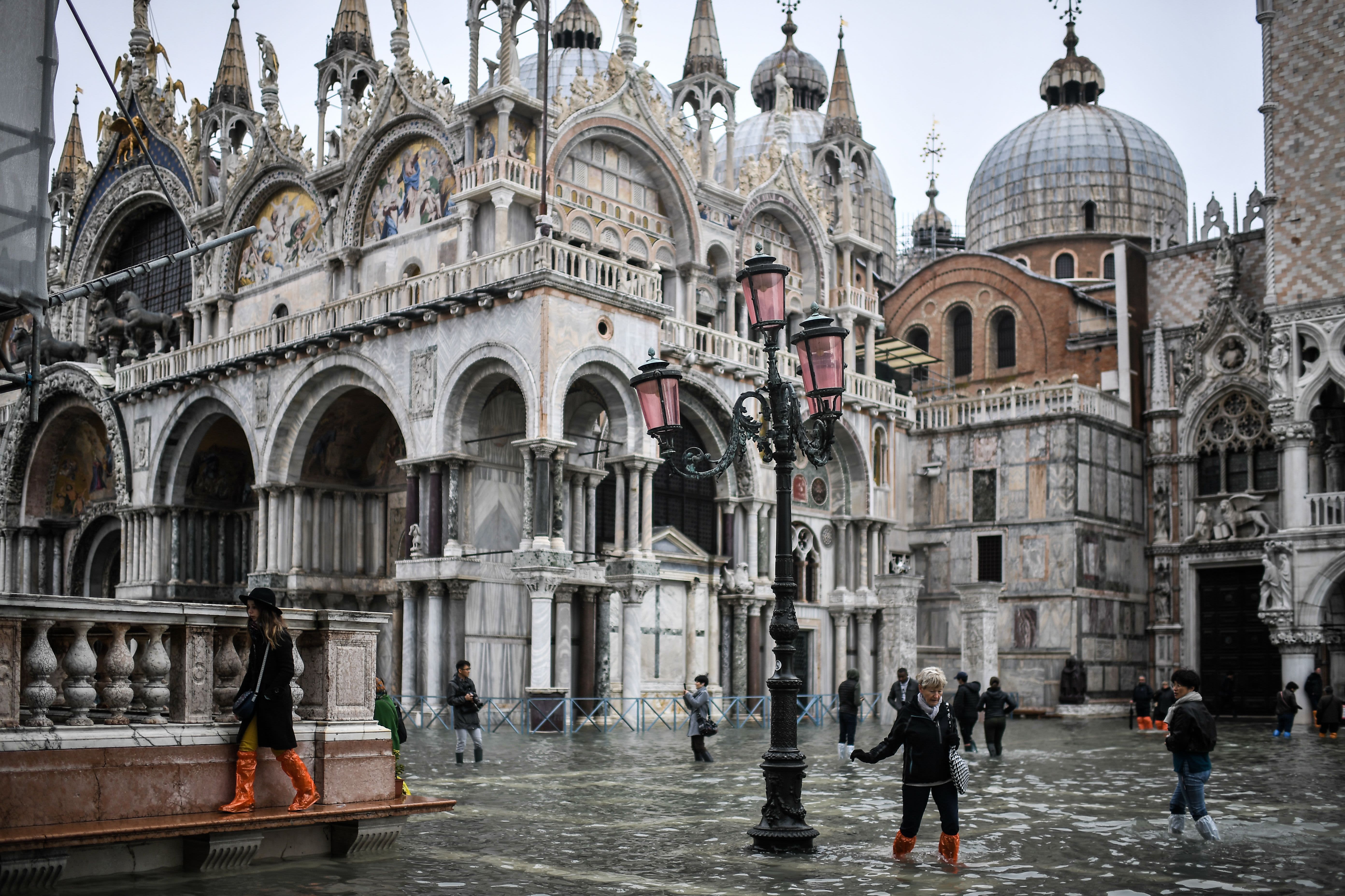 Climate change blamed as floods overwhelm Venice, swamping basilica and squares - CNBC