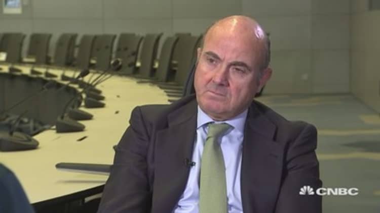 Low rates and modest growth influencing financial stability, ECB's de Guindos says