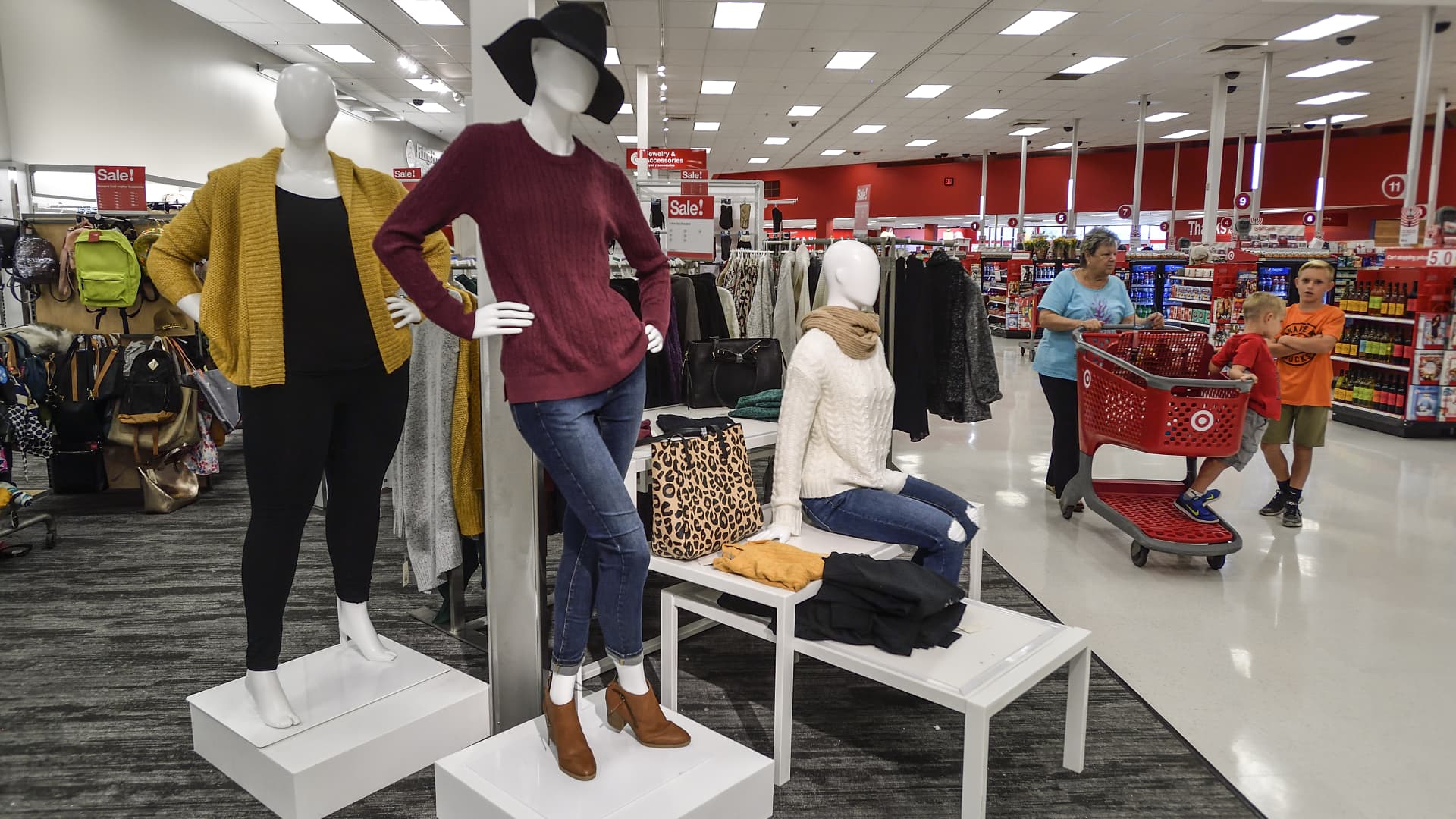 An increased number of mannequins feature clothing and shoes throughout the remodeled Target store in Orange, California.