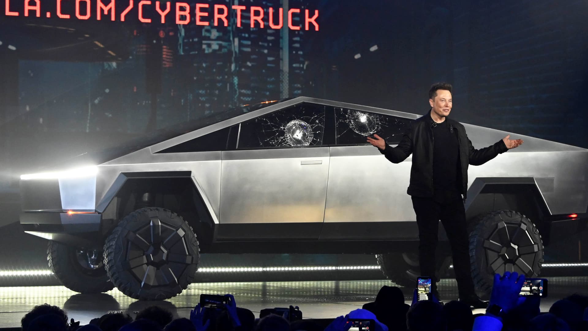 Tesla CEO Elon Musk unveils the Cybertruck at the TeslaDesign Studio in Hawthorne, Calif. The cracked window glass occurred during a demonstration on the strength of the glass.