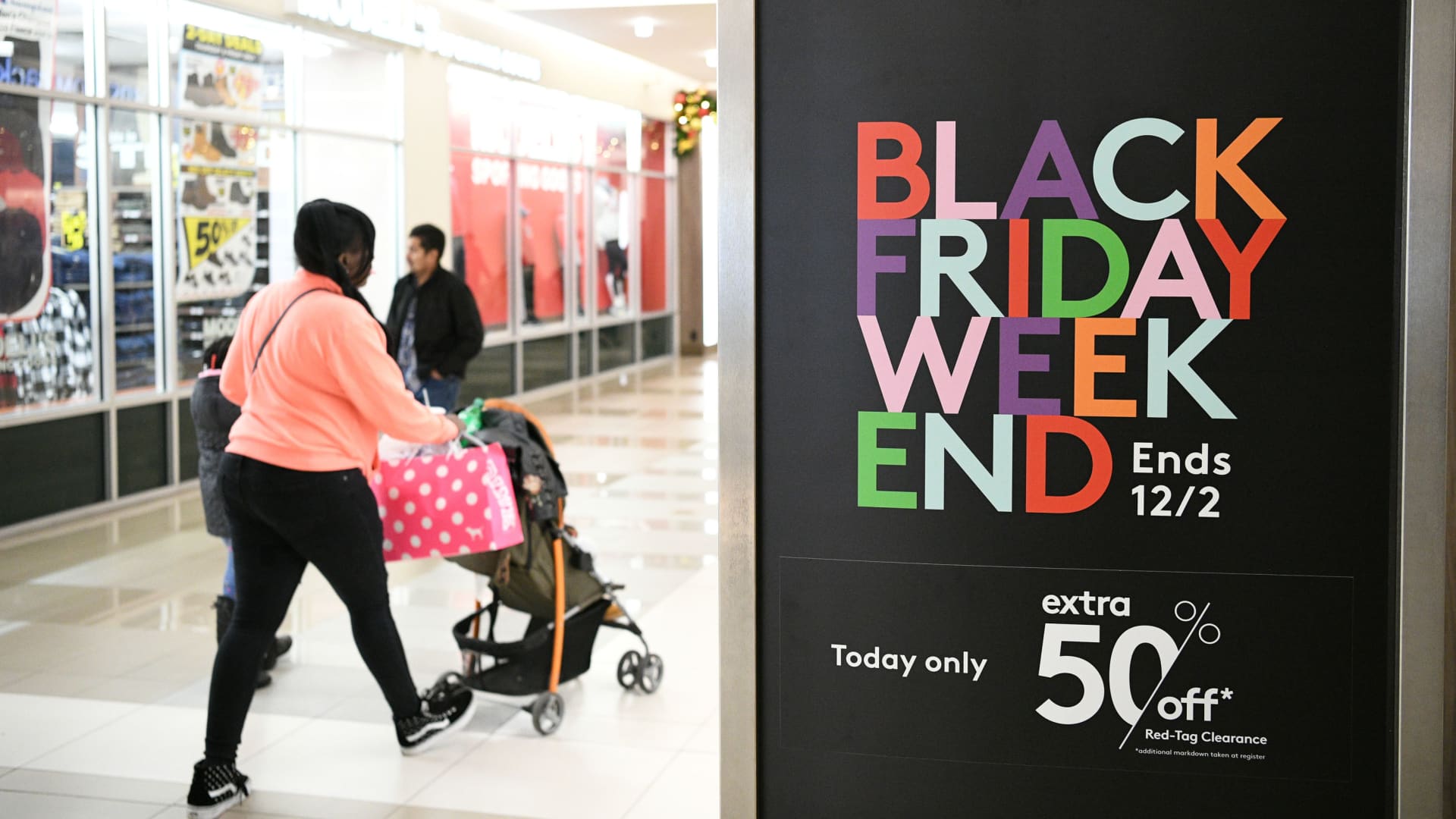 Holiday shoppers look for deals during the Black Friday sales event at the Pentagon Centre shopping mall in Arlington, Virginia, November 29, 2019.