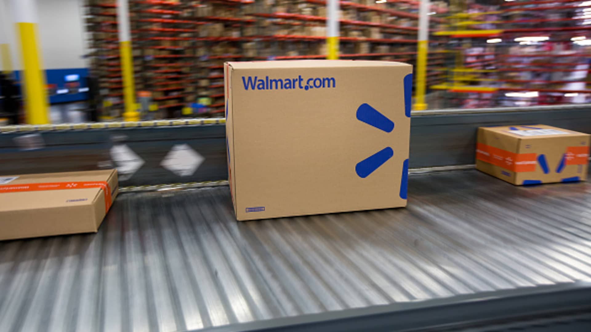 Walmart bets its stores will give it an edge in  e-commerce duel