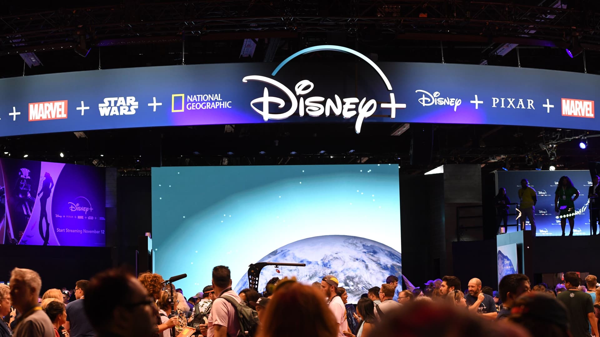 Attendees visit the Disney+ streaming service booth at the D23 Expo on August 23, 2019 at the Anaheim Convention Center in Anaheim, California.