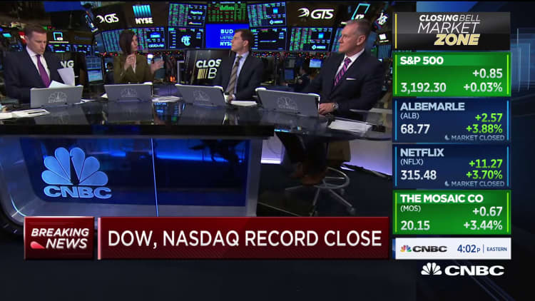 The Dow and Nasdaq close at record-highs...again