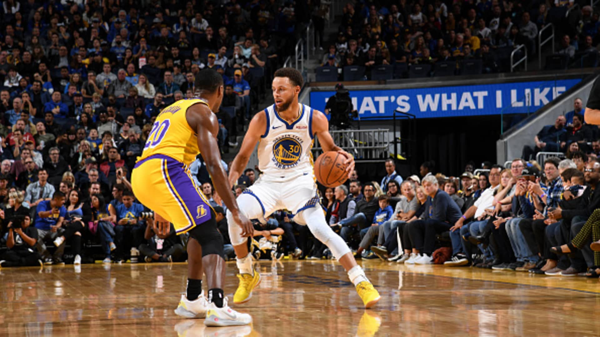 Stephen Curry #30 of the Golden State Warriors handles the ball against the Los Angeles Lakers during a pre-season game on October 18, 2019 at Chase Center in San Francisco, California.
