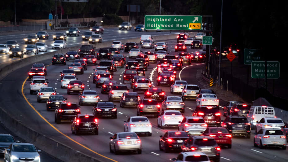 Motor vehicles drive on the 101 freeway in Los Angeles, California