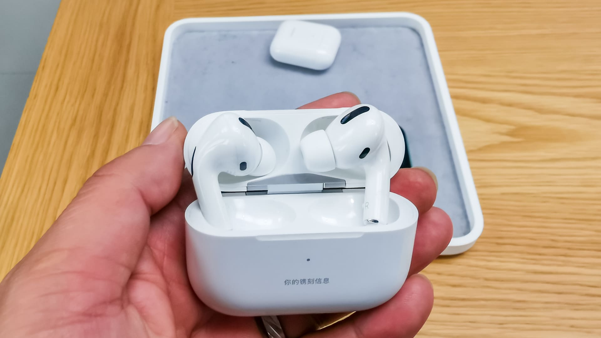 A man shows AirPods Pro at an Apple store on East Nanjing Road on October 30, 2019 in Shanghai, China. Apple's new AirPods Pro with active noise cancellation are on sale on October 30 in China.