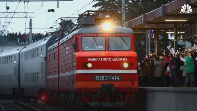 Russian President Vladimir Putin opens rail route linking country's two biggest cities to Crimea