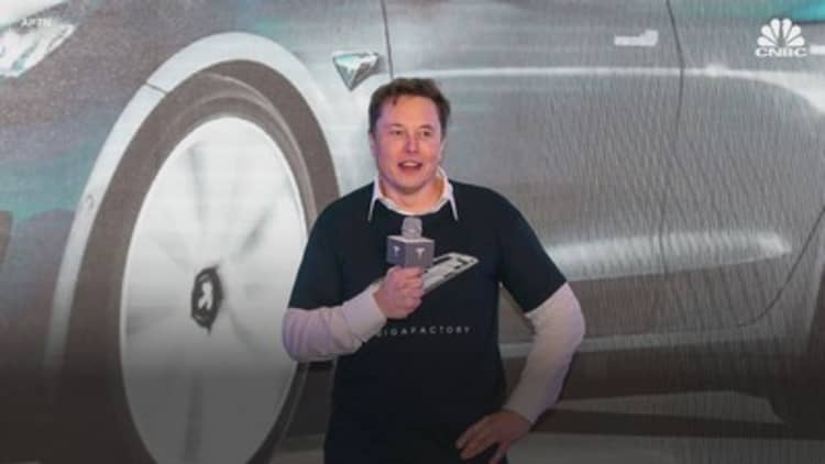 Tesla CEO Elon Musk dances to celebrate Model 3 sedan deliveries at new plant in Shanghai